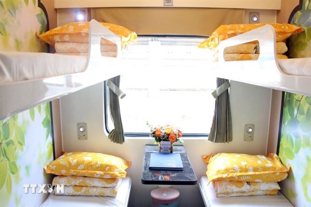 Amenities inside a four-bed cabin on the new HCM City - Đà Nẵng train service include Wi-Fi, air-conditioning, reading lights, charging ports, and comfortable bedding. VNA/VNS Photo